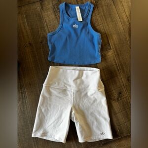 ALO Yoga Blue Ribbed Cropped Tank and white biker shorts